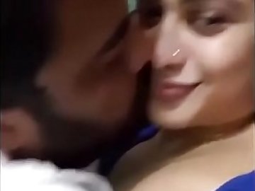 Indian couple kissing